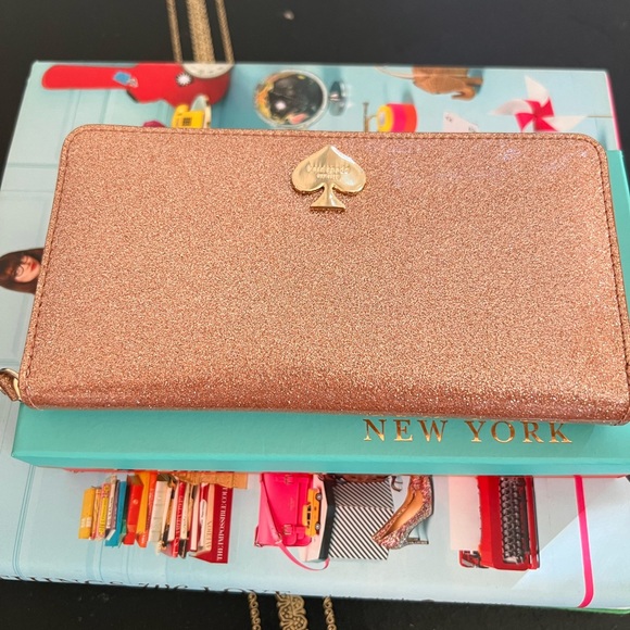 kate spade Handbags - Kate spade Lacey rose gold glitter never used wallet with original box!